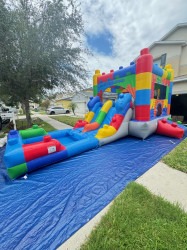 5F46421E 6E00 4DE9 8C5E 592F1662F539 1724517130 Lego bounce house and dual water slide